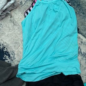 Ivivva Teal tank top with built in bra and black shorts size 12 Sold as outfit